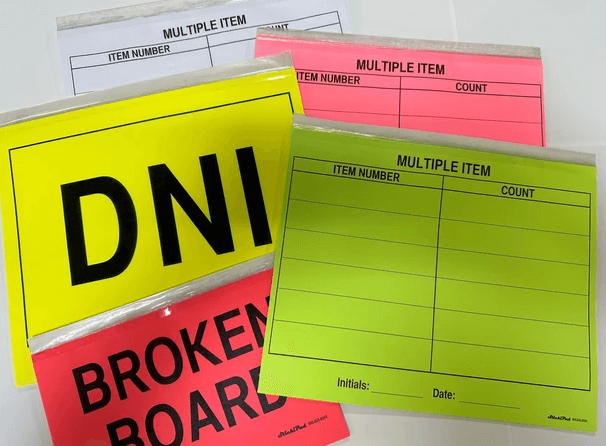 A set of warehouse tags in various bright colors