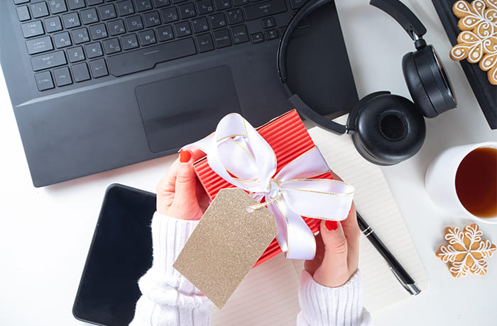 A person presenting a gift