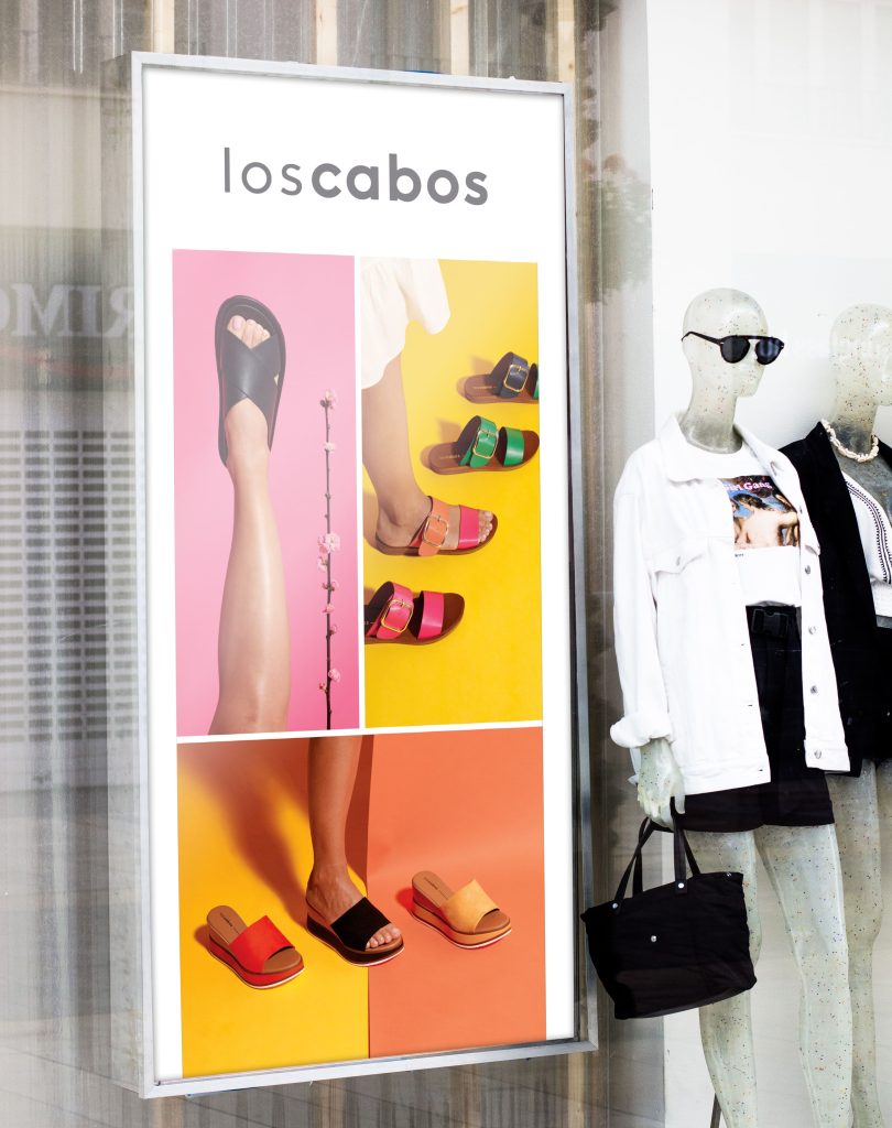 Los Cobos in-person retail display with mannequin. 